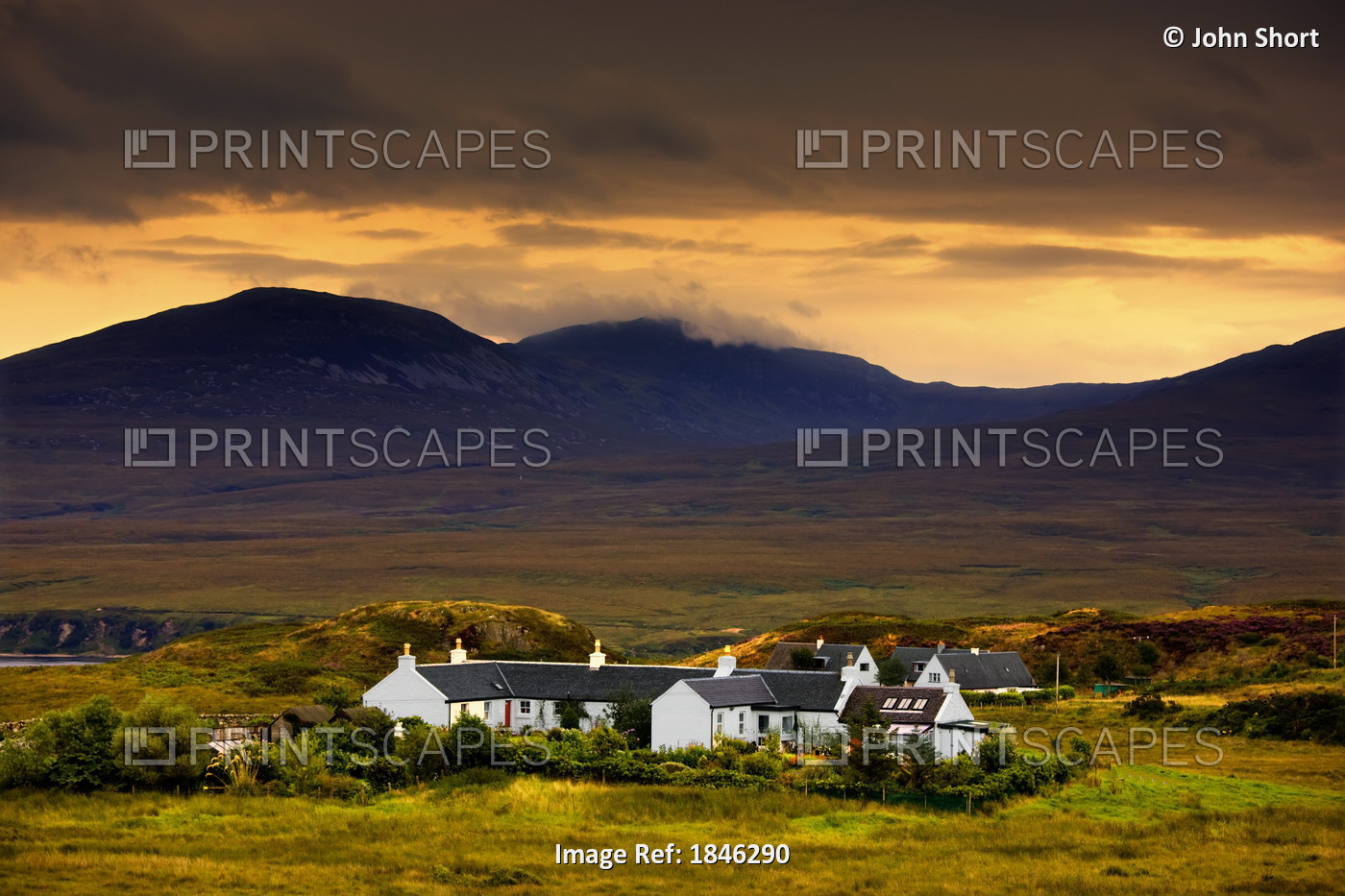Paps Of Jura, Jura, Scotland; Houses With Mountain Backdrop