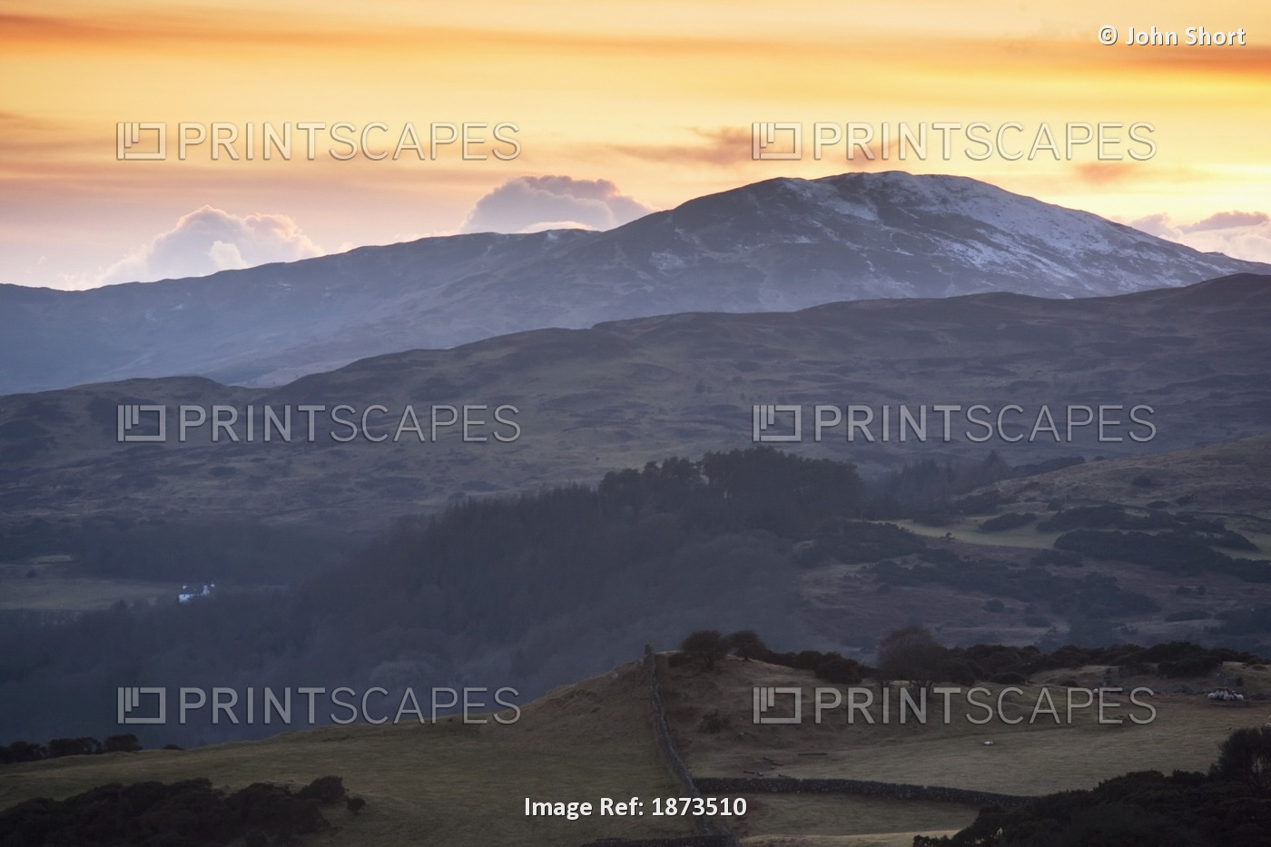 Dumfries, Scotland; A Hilly Landscape At Sunset