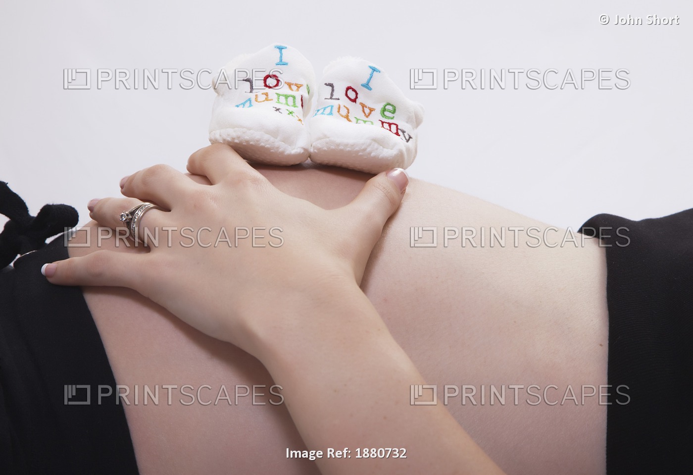 Pregnant Woman With 'i Love Mummy' Booties On Her Bare Belly; Tyne & Wear, ...