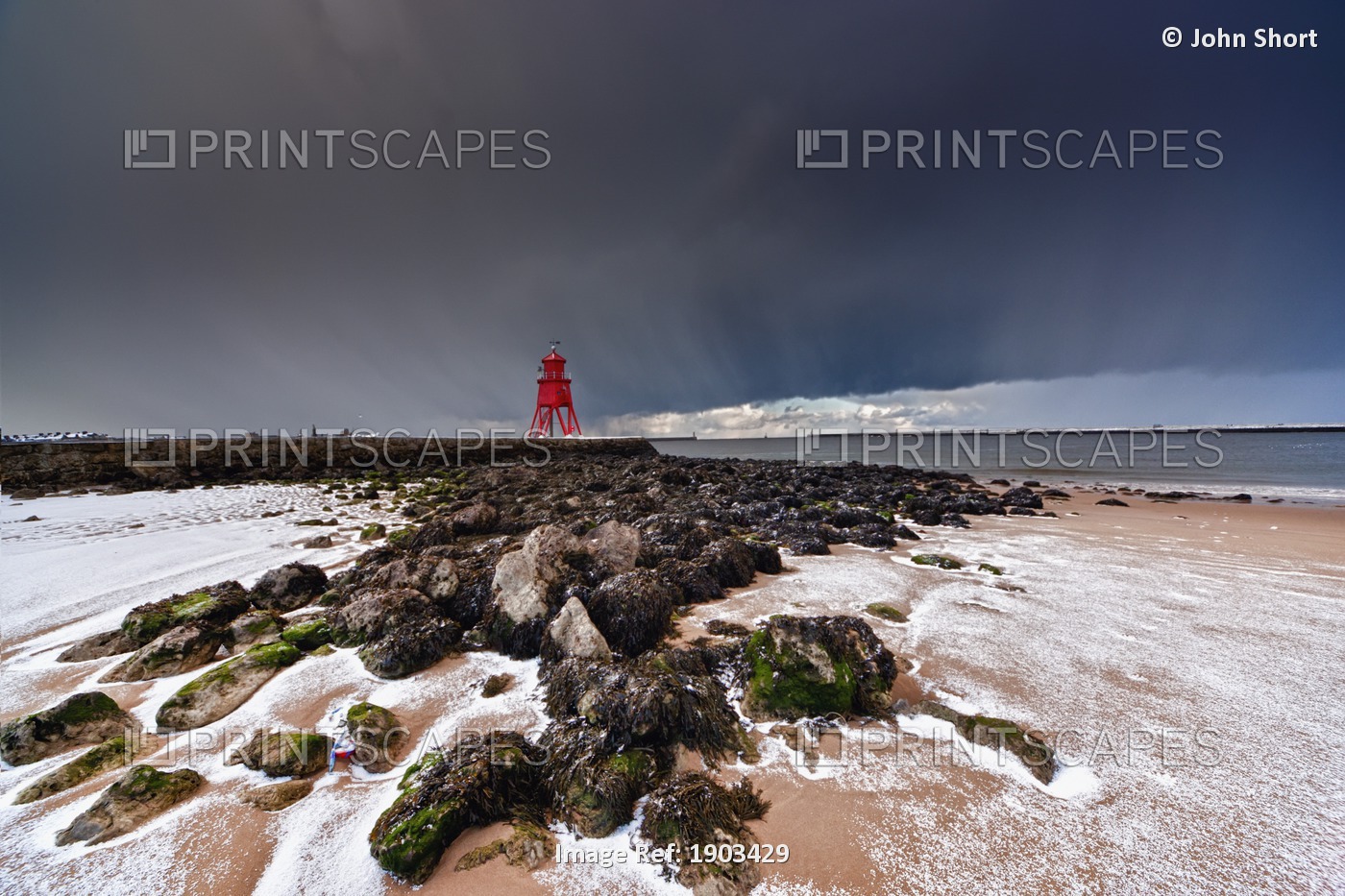 A Red Lighthouse Along The Coast Under A Stormy Sky; South Shields, Tyne And ...