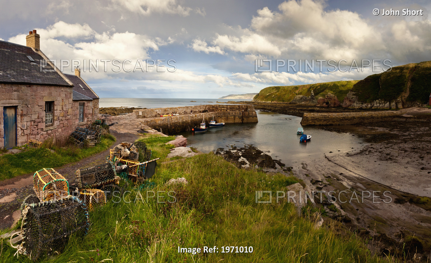 Fishing Traps A House And Boats Mooring On The Coast; Cove Lothian Scotland