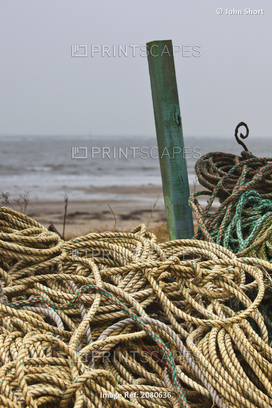 Piles Of Various Ropes At The Water's Edge; Boulmer, Northumberland, England
