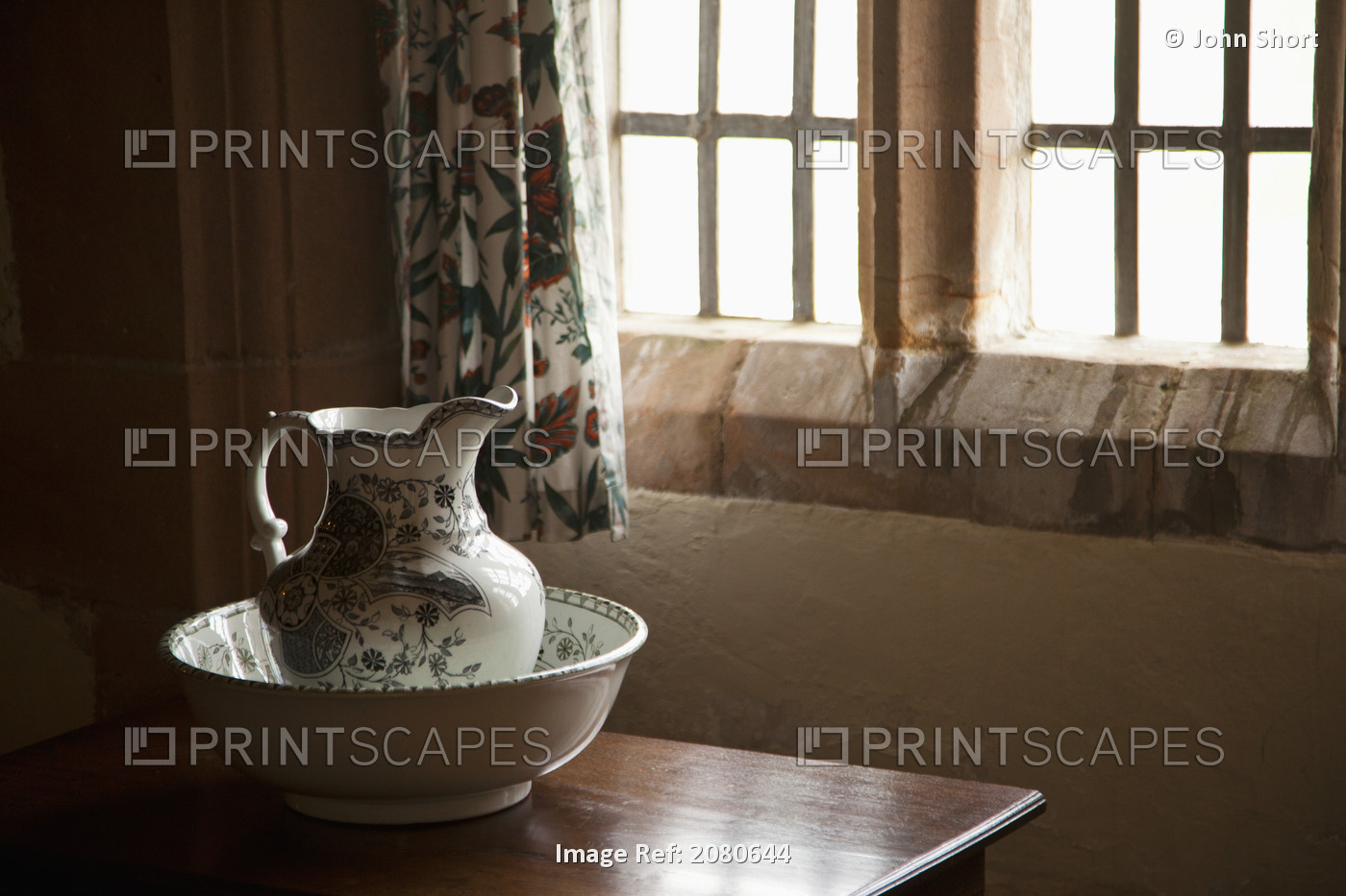 A Pitcher And Basin Sit On The Table Beside A Window; Lindisfarne, ...