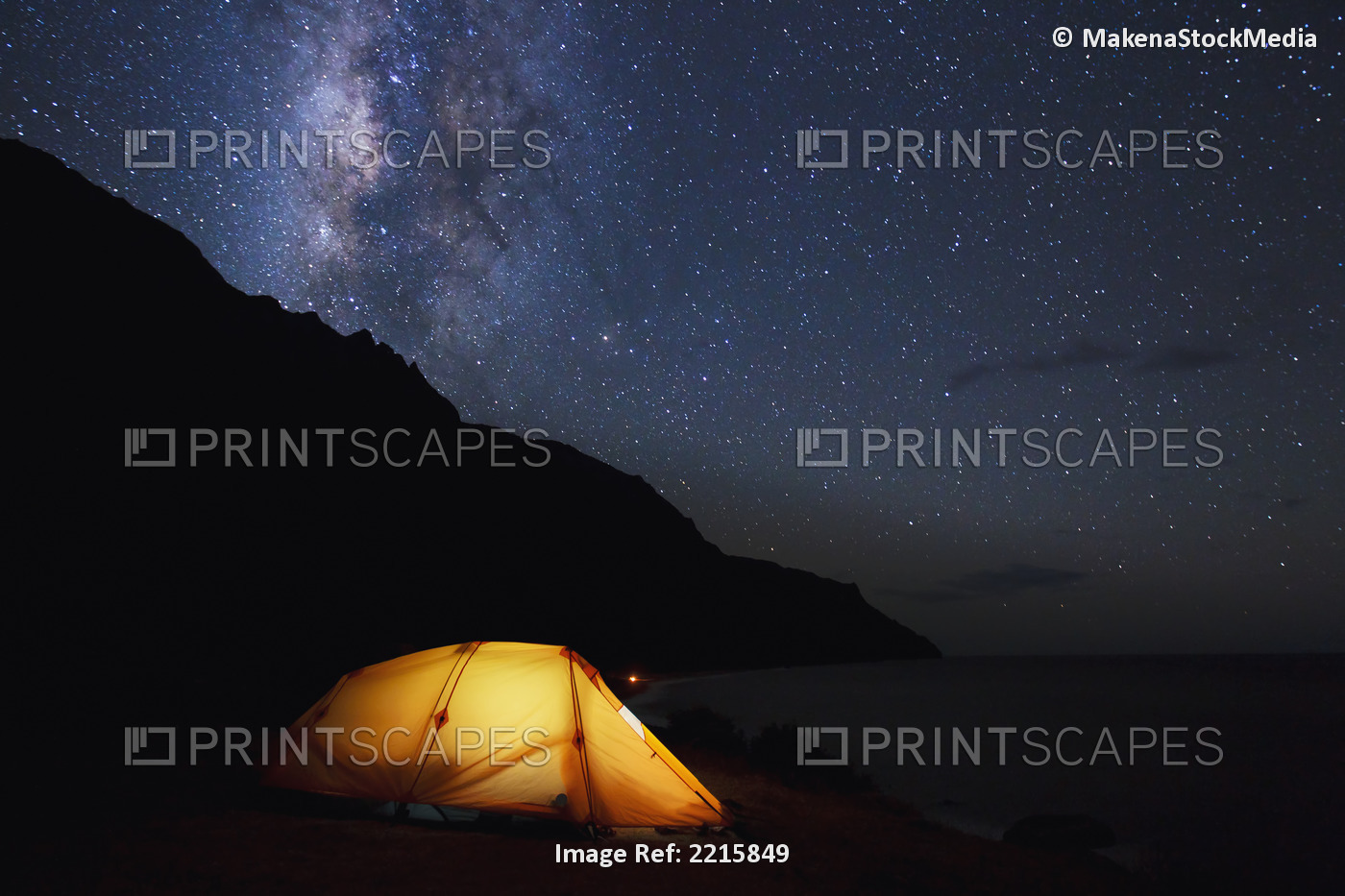 Hawaii, Kauai, Na Pali Coastline and Kalalau Mountains, Iluminated tent and ...
