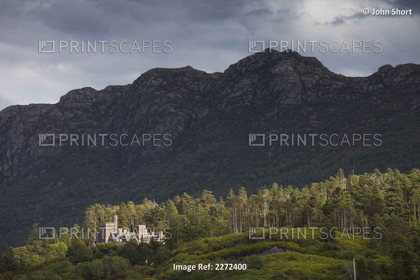 Castle on a hill on the edge of a forest; Plockton ros-shire scotland