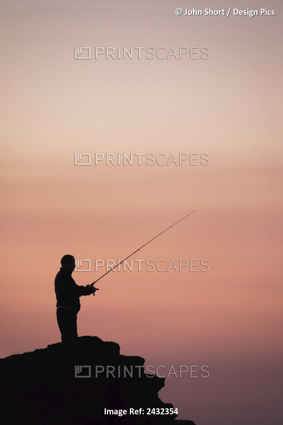 Silhouette Of A Man Fishing At Sunset; Caloundra, Queensland, Australia