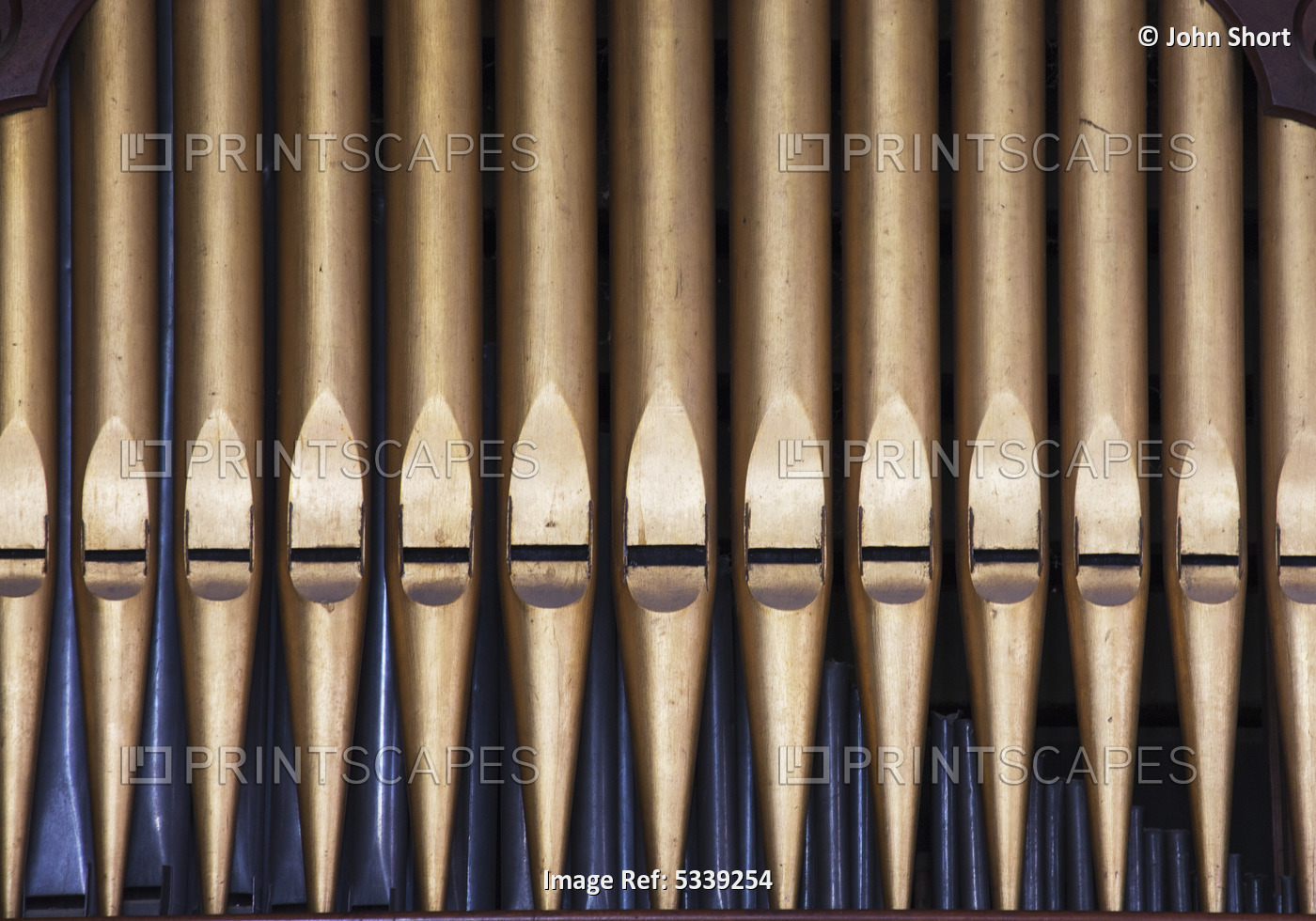 Close Up Of Pipes On A Musical Instrument