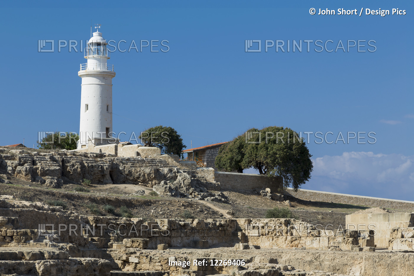 White Lighthouse Against A Blue Sky; Paphos, Cyprus