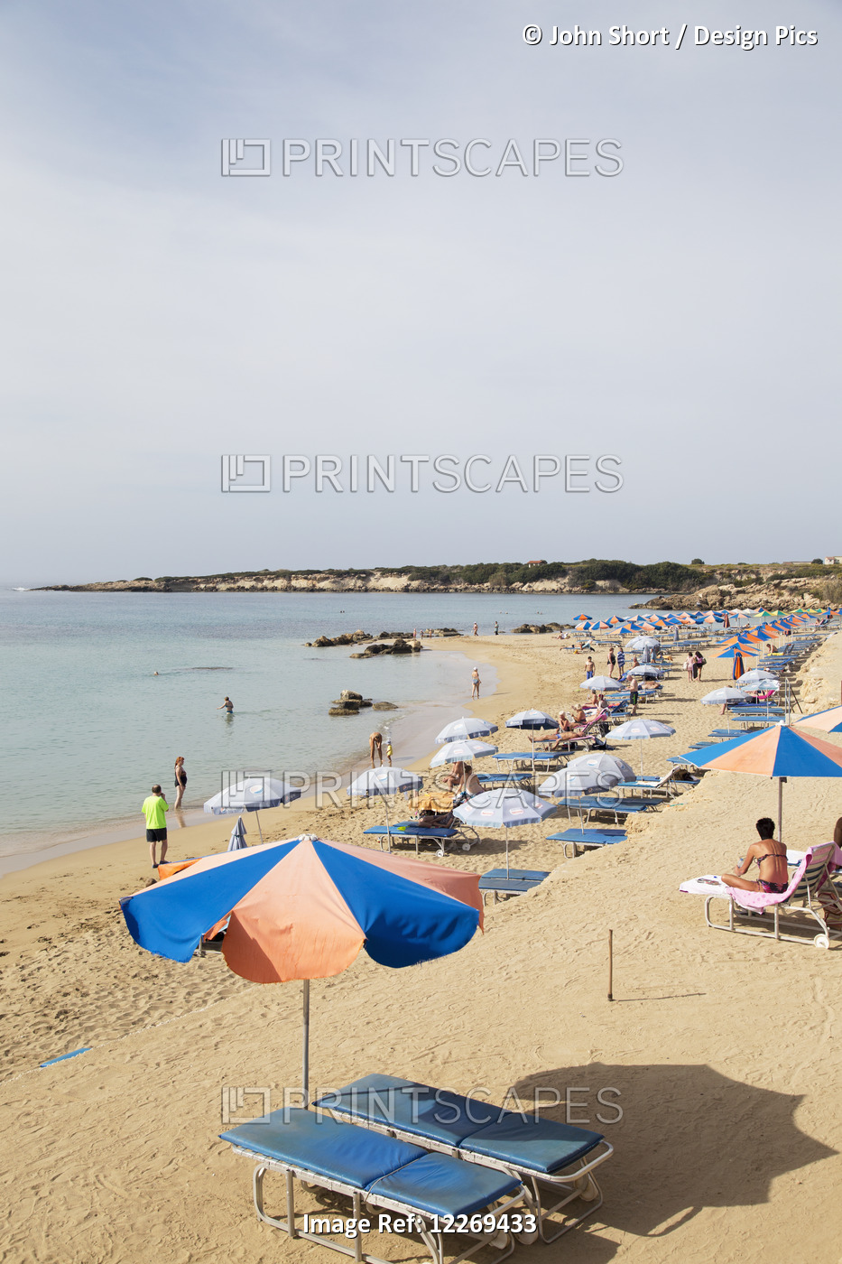 Sunbathing On The Beach Along The Mediterranean; Peyia, Paphos, Cyprus