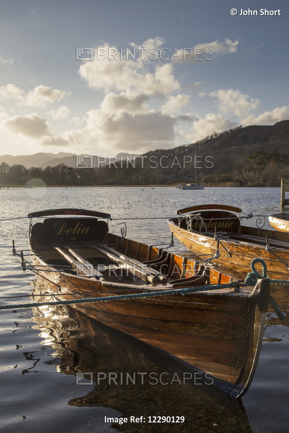 Woden Boats Tied At The Water's Edge On A Tranquil Lake; South Lakeland ...