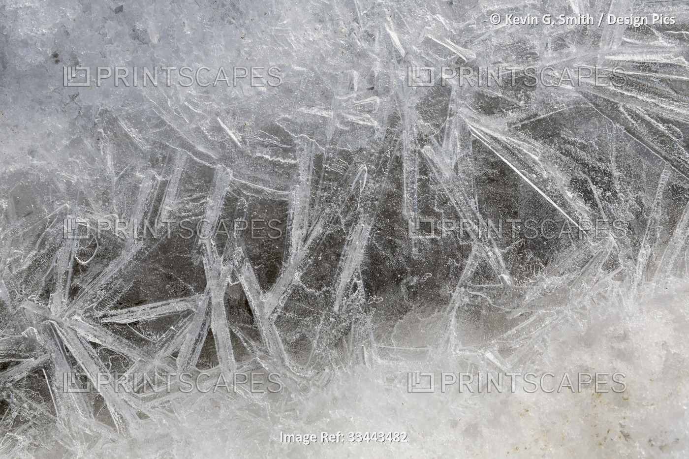 Ice crystal details in the melting snow and ice lining the shore of Kotzebue ...